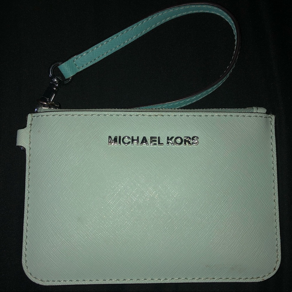 Micheal Kors light blue wristlet, 3 card pockets